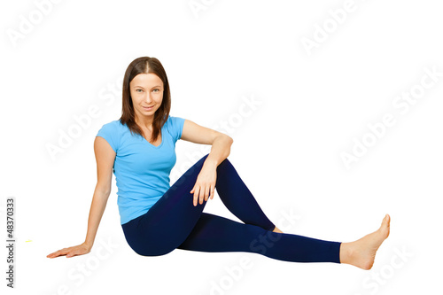 Photo: exercising woman isolated on white exercising woman isolated on white