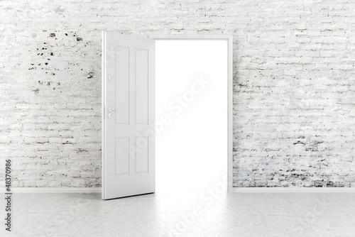 Photo: 3d open door in a white vintage brick wall 3d open door in a white vintage brick wall
