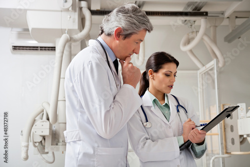 Photo: Radiologists In A Discussion Radiologists In A Discussion