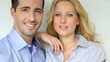 Cheerful couple talking to camera