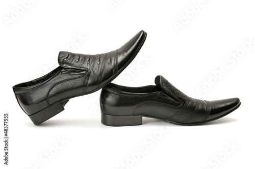 Photo: Man's shoes isolated on white background Man's shoes isolated on white background