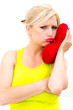 sad woman holding red valentine heart