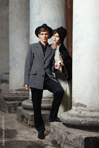 Photo: Retro styled fashion portrait of a young couple. Clothing and ma Retro styled fashion portrait of a young couple. Clothing and ma