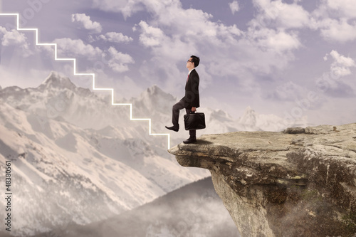 Photo: Business agent stepping on virtual stairs Business agent stepping on virtual stairs