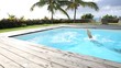 Man diving in private swimming-pool