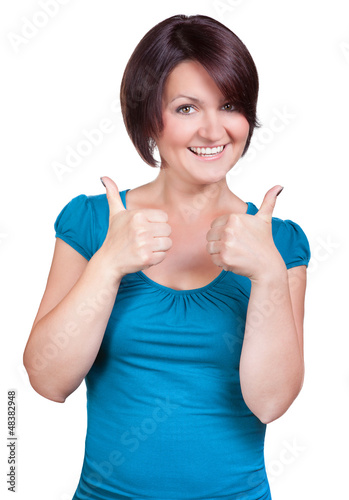 Photo: Junge Frau hebt optimistisch die Daumen Junge Frau hebt optimistisch die Daumen