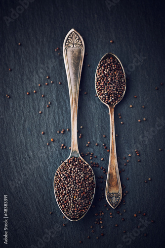 Photo: Simple still life with black mustard seeds Simple still life with black mustard seeds