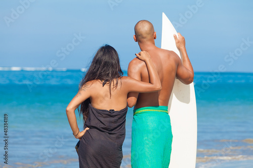 Photo: young couple on beach young couple on beach