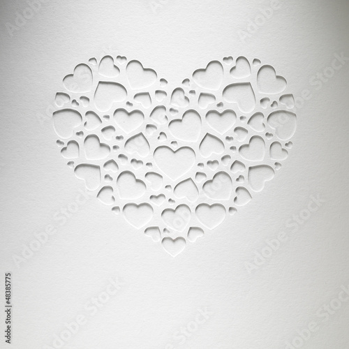 Photo: Valentine day heart made of small hearts on paper card Valentine day heart made of small hearts on paper card