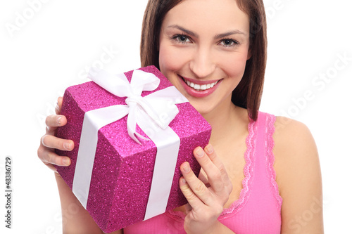 Photo: Woman holding present Woman holding present