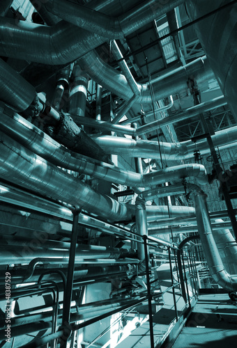 Photo: Industrial zone, Steel pipelines and cables in blue tones Industrial zone, Steel pipelines and cables in blue tones