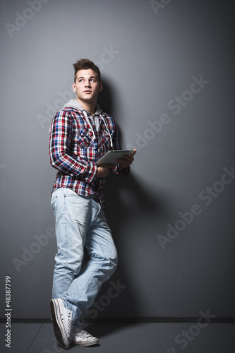 Photo: Young man looking to the left Young man looking to the left