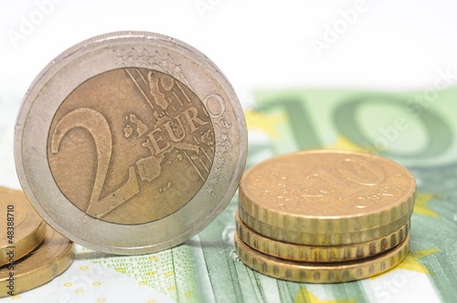 Photo: Euro coins placed on the Euro bank note. Euro coins placed on the Euro bank note.