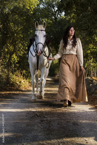 Photo: classical girl with a white horse classical girl with a white horse