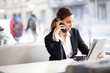 Candid image of a businesswoman working in a cafe. Selectve focu