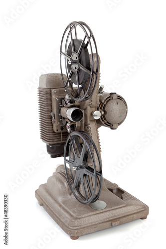 Photo: Vintage movie projector on a white background Vintage movie projector on a white background