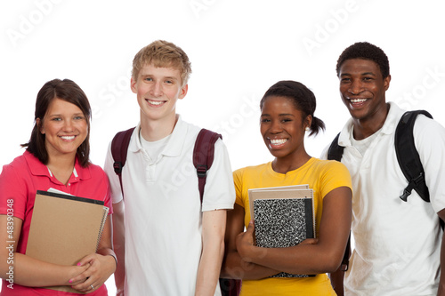 Photo: Multi-ethnic college students/friends with backpacks and books o Multi-ethnic college students/friends with backpacks and books o