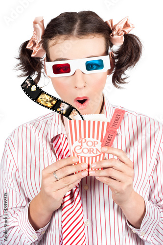 Photo: Girl In Pigtails Watching A 3D Comedy Movie Girl In Pigtails Watching A 3D Comedy Movie