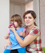 woman wipes snivels daughter