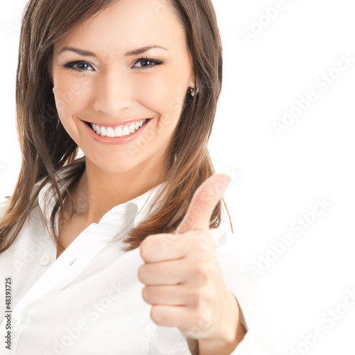 Photo: Happy businesswoman with thumbs up gesture Happy businesswoman with thumbs up gesture