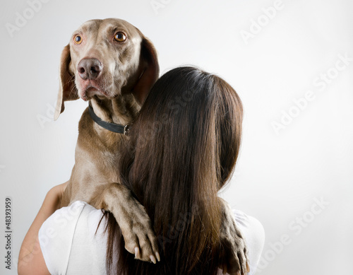 Photo: young woman with her dog young woman with her dog