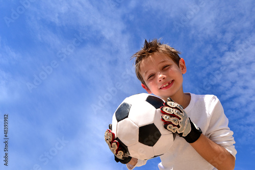 Photo: Kind mit fußball Kind mit fußball