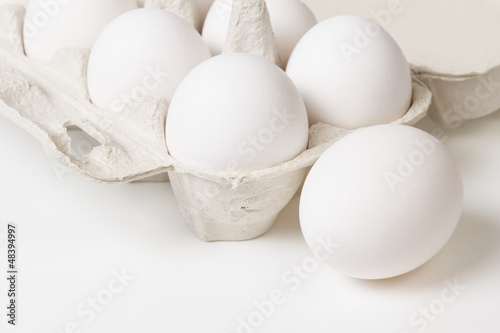 Photo: detail photo of open container with eggs detail photo of open container with eggs