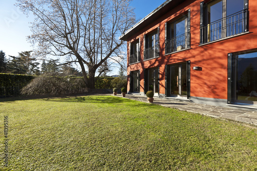 Photo: beautiful apartment, outdoor, red facade beautiful apartment, outdoor, red facade