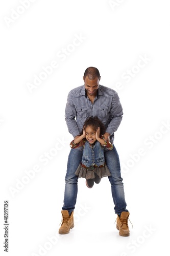 Photo: Father and daughter playing Father and daughter playing