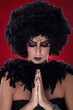 Praying devil