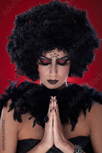 Photo: Praying devil Praying devil