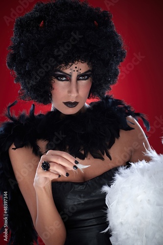 Photo: Evil with angel feathers Evil with angel feathers