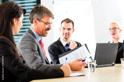 Photo: Business - businesspeople have team meeting Business - businesspeople have team meeting