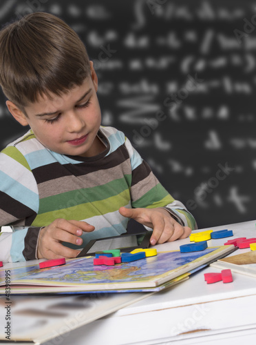 Photo: boy learning boy learning
