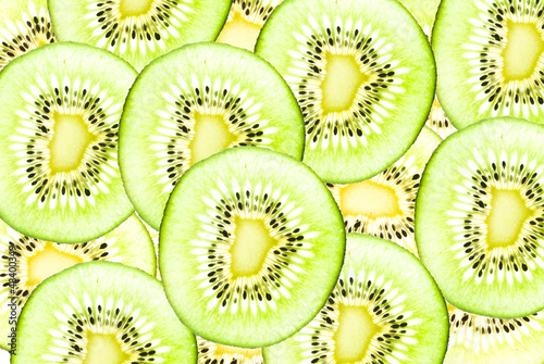 Photo: Kiwi healthy fruit texture background. Kiwi healthy fruit texture background.