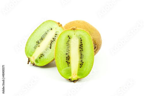 Photo: Kiwi healthy fruit isolated on the white. Kiwi healthy fruit isolated on the white.