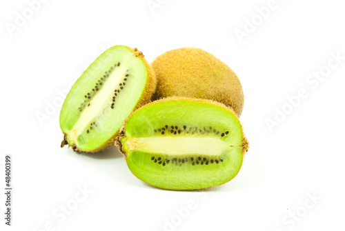 Photo: Kiwi healthy fruit isolated on the white. Kiwi healthy fruit isolated on the white.