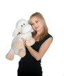 Happy woman with toy sheep over white