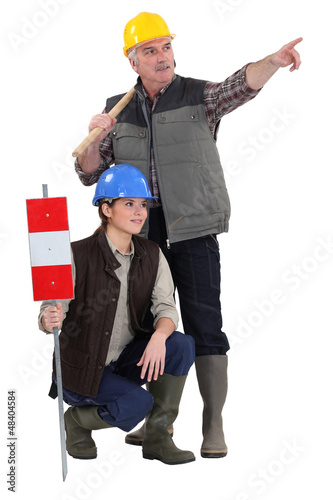 Photo: Tradespeople being distracted from their work Tradespeople being distracted from their work