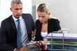 Boss and secretary working together