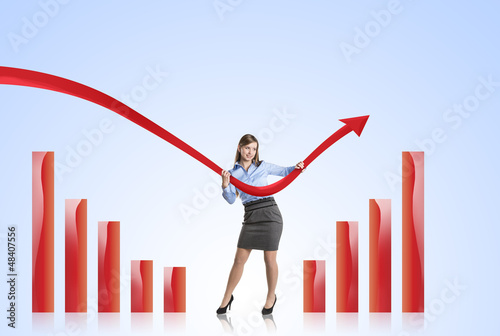 Photo: Woman with statistics curve Woman with statistics curve