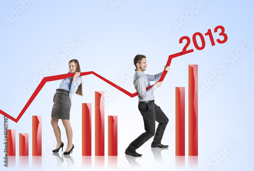Photo: Woman with statistics curve Woman with statistics curve