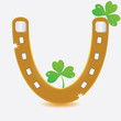 Horseshoe and four leaf clover.
