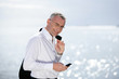 businessman on vacation talking on his cell