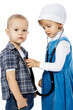 girl listens with stethoscope boy