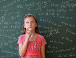 schoolgirl and blackboard with copy space