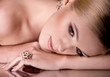 young woman with makeup in luxury jewelry
