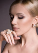 Photo: young woman with makeup in luxury jewelry young woman with makeup in luxury jewelry