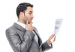 Businessman reading - looking papers, isolated