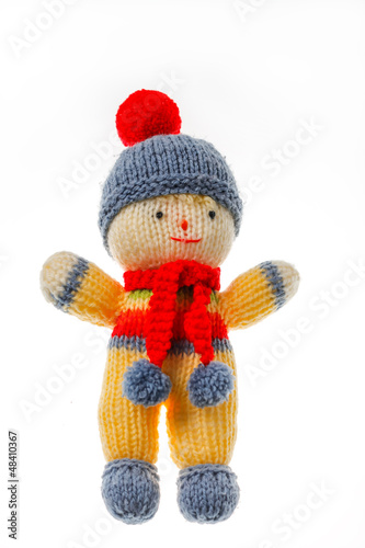 Photo: Colorful handmade knitted toy on white background Colorful handmade knitted toy on white background